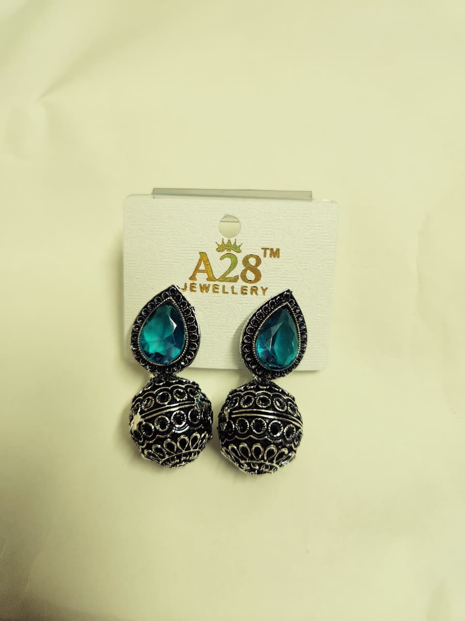 Oxidized Jhumka Earrings with Teardrop Stone
