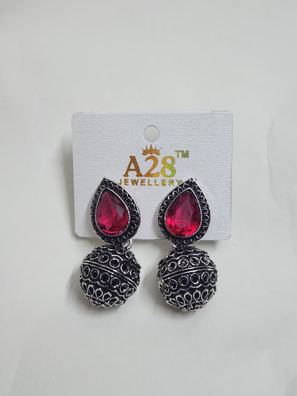 Oxidized Jhumka Earrings with Teardrop Stone