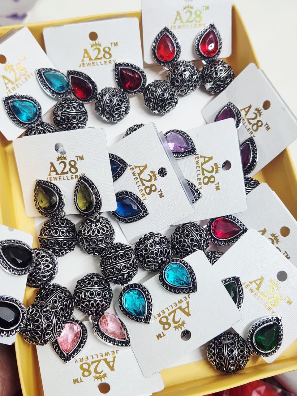 Oxidized Jhumka Earrings with Teardrop Stone