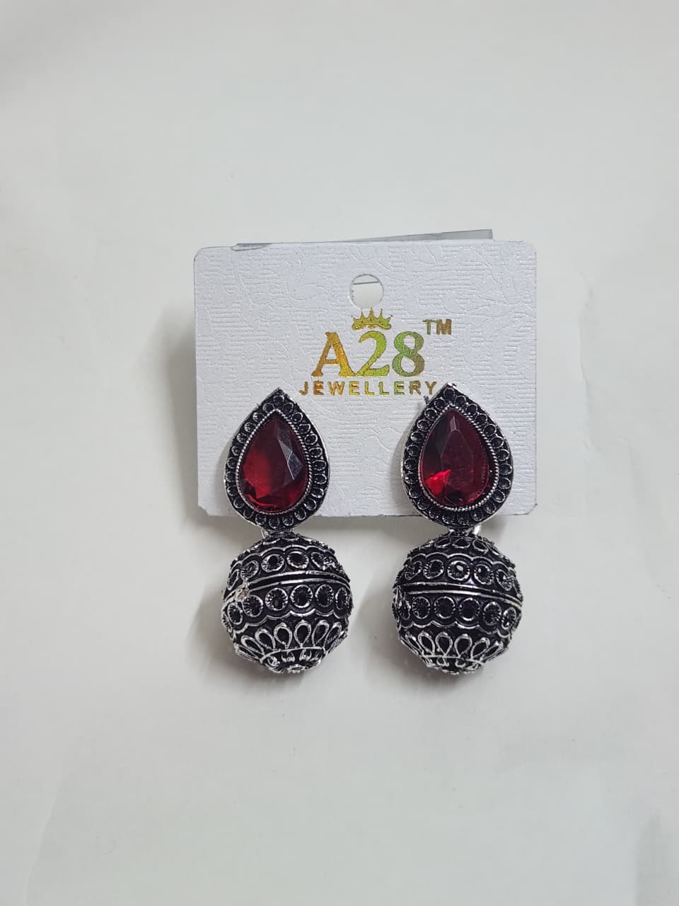 Oxidized Jhumka Earrings with Teardrop Stone