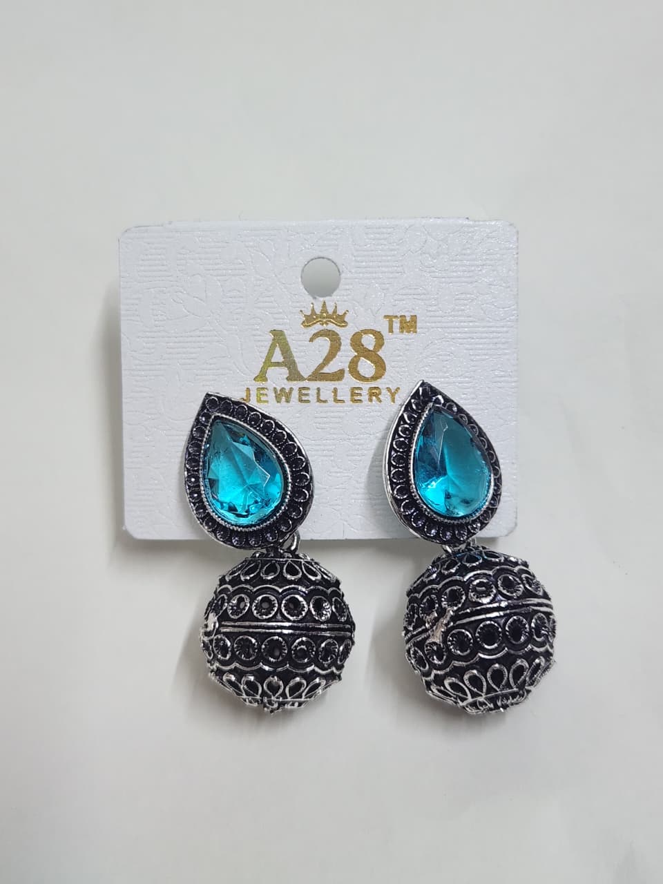 Oxidized Jhumka Earrings with Teardrop Stone