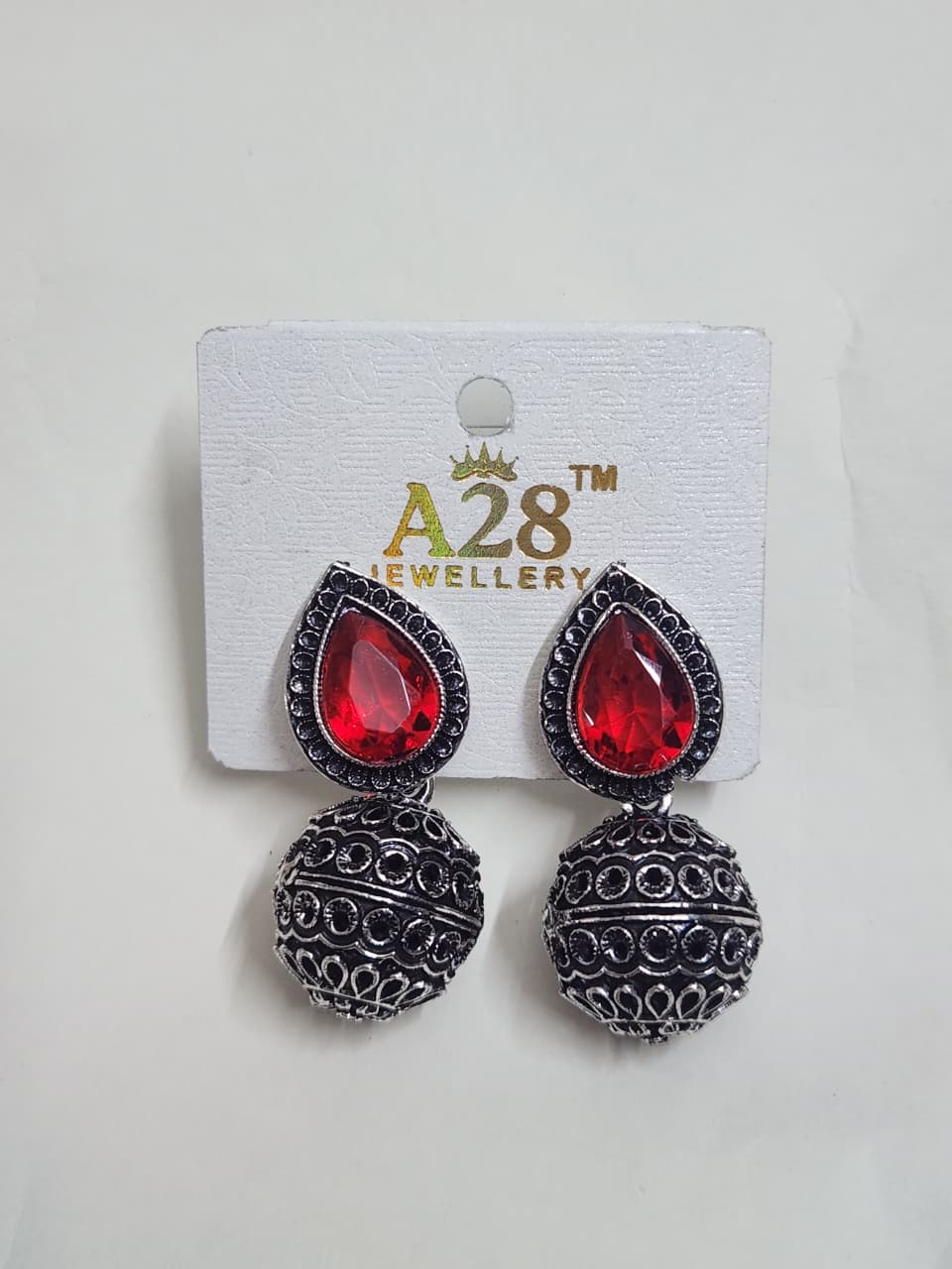 Oxidized Jhumka Earrings with Teardrop Stone